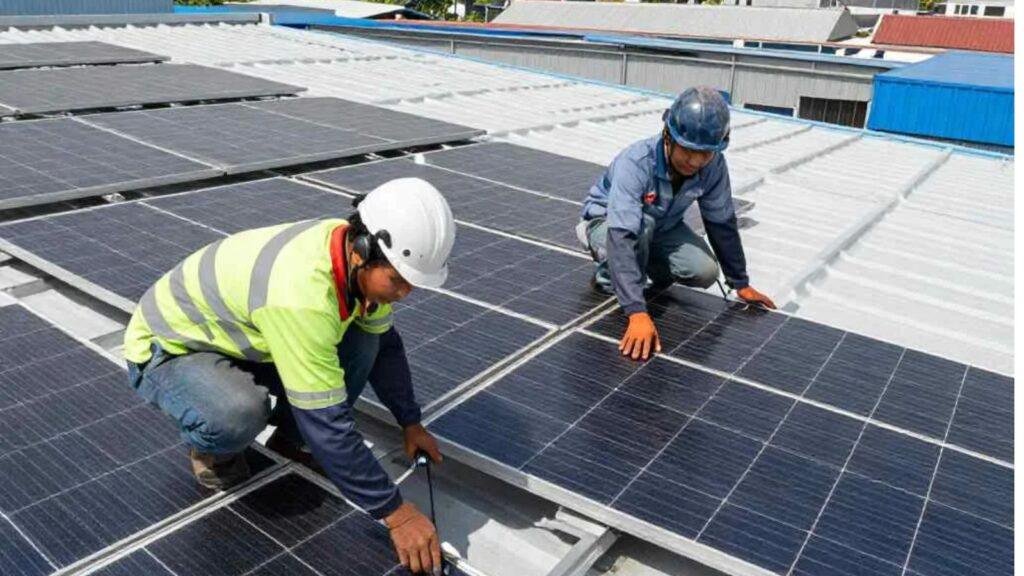 Professional Right Price Solar installers fitting solar panels to a residential roof in Thailand.
